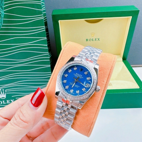 Rolex Đính Đá |Nữ Giới |Mặt Xanh Dương |Dây Kim Loại Silver |Máy Pin (Máy Quartz) |Size 31mm