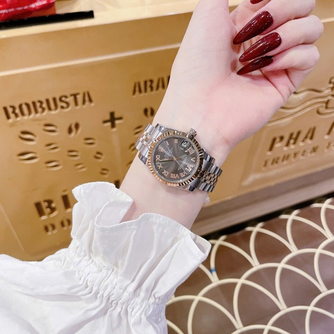 Rolex Mặt Số La Mã |Nữ Giới |Đen |Niềng Khía |Dây Kim Loại Demi |Máy Pin (Máy Quartz) |Size 31mm