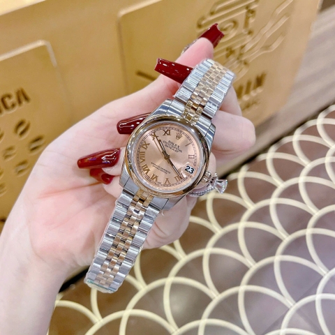 Rolex Mặt Số La Mã |Nữ Giới |Mặt Hồng |Niềng Trơn |Dây Kim Loại Demi |Máy Pin (Máy Quartz) |Size 31mm