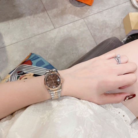 Rolex Mặt Số La Mã |Nữ Giới |Nâu |Niềng Khía |Dây Kim Loại Demi |Máy Pin (Máy Quartz) |Size 31mm