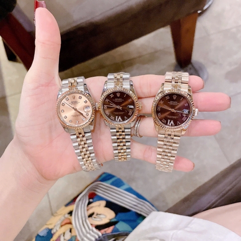 Rolex Mặt Số La Mã |Nữ Giới |Nâu |Niềng Khía |Dây Kim Loại Demi |Máy Pin (Máy Quartz) |Size 31mm