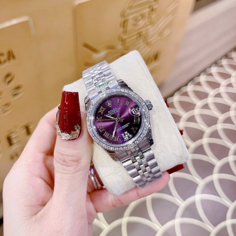 Rolex Mặt Số La Mã |Nữ Giới |Tím |Đính Đá |Dây Kim Loại Silver |Máy Pin (Máy Quartz) |Size 31mm