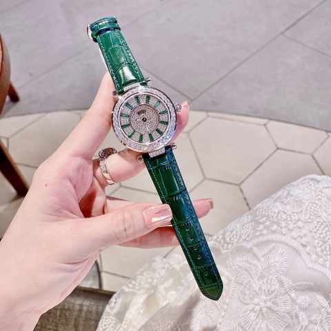 Xcer Ông Mặt Trời |Nữ Giới |Đính Full Đá |Silver |Dây Da Xanh Lá |Máy Pin (Quartz) |Size 38mm