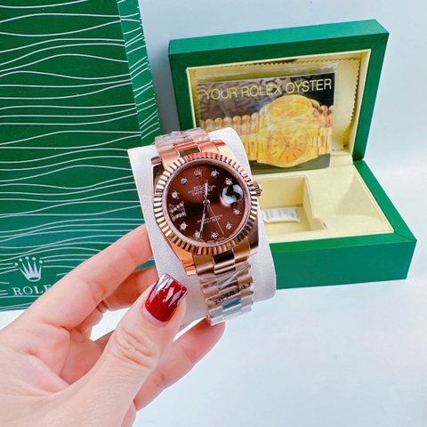 Rolex Đính Đá Ngôi Sao |Cặp Đôi |Nâu |Niềng Khía |Dây Kim Loại Rose Gold |Máy Pin (Máy Quartz) |Size 36x31mm