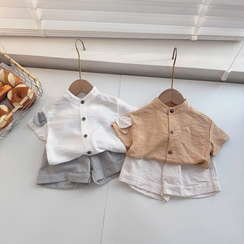 T553-Áo smi trắng đũi quần kẻ (05.14kg)