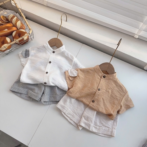 T553-Áo smi trắng đũi quần kẻ (05.14kg)