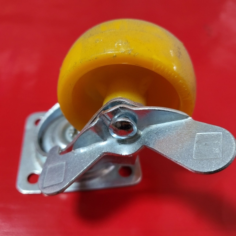 Bánh xe nhựa vàng có thắng