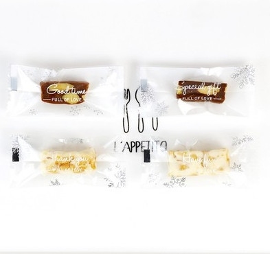 TK014 Túi kẹo chữ màu trắng (tập 100c) - 4x9cm