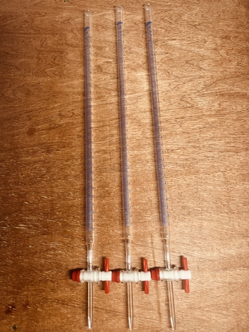 Buret thủy tinh khóa nhựa PTFE 25ml, Class A, Hãng OMSONS GERMANY