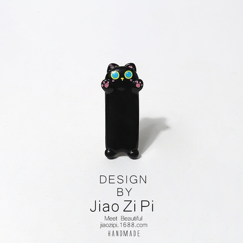 Kẹp tóc nhựa hình mèo xin ôm