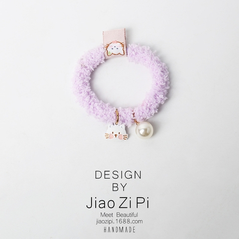 Dây buộc tóc màu tím hình mèo trắng và ngọc trai