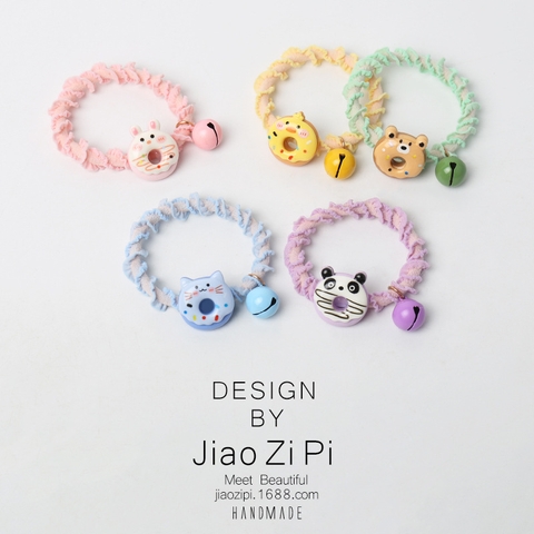 Dây buộc tóc màu xanh họa tiết hình đầu mèo