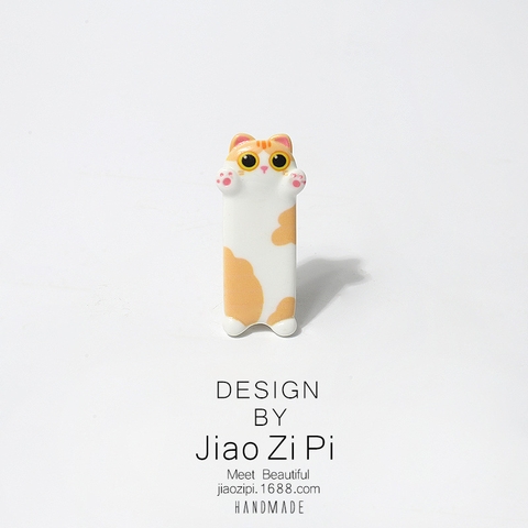 Kẹp tóc nhựa hình mèo cam