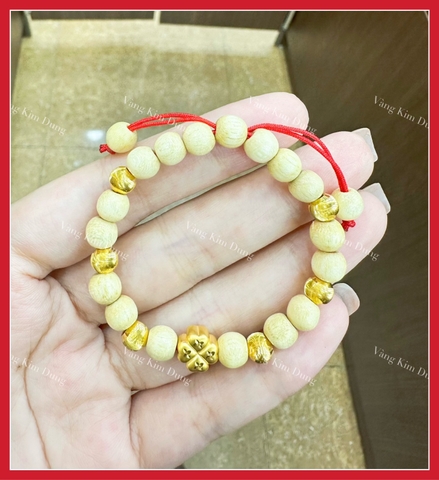 Vòng dâu tằm mix charm vàng 24k cỏ 4 lá