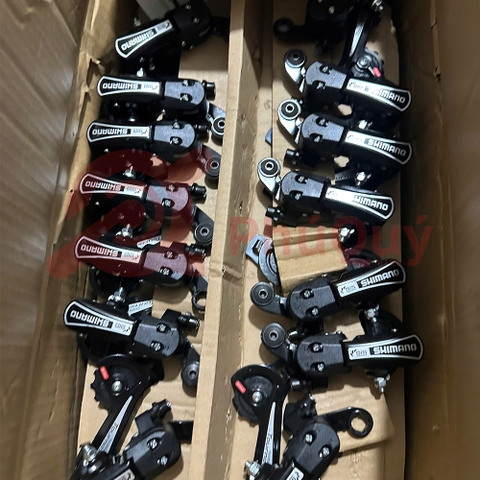CÙI ĐỀ 7S SHIMANO TY21B MÀU ĐEN TOURNEY BẮT ỐC