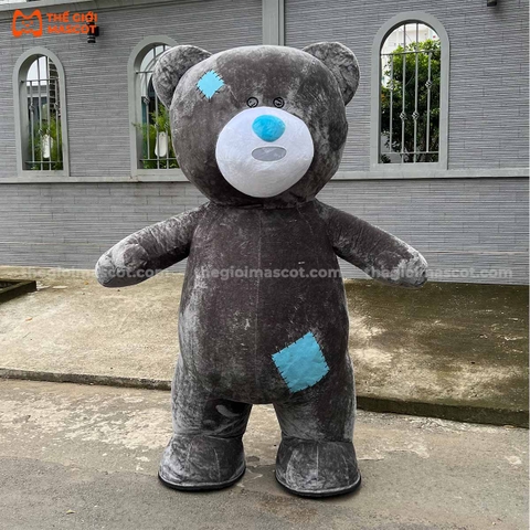 Mascot Hơi Gấu Xám Bị Thương