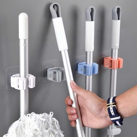 Giá kẹp cán chổi. treo ô (dán tường)