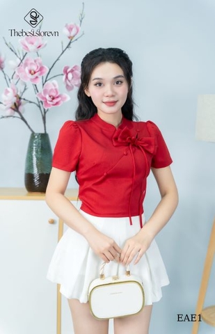 Áo cutout nút bọc đính dây nơ