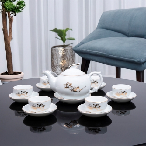 Bộ ấm chén sứ trắng hoa sen vàng