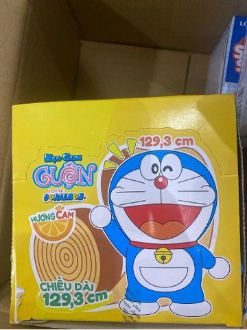 Kẹo Gum Cuộn Hương Cam Doraemon Suku Suku Lotte 8g Nhật Bản