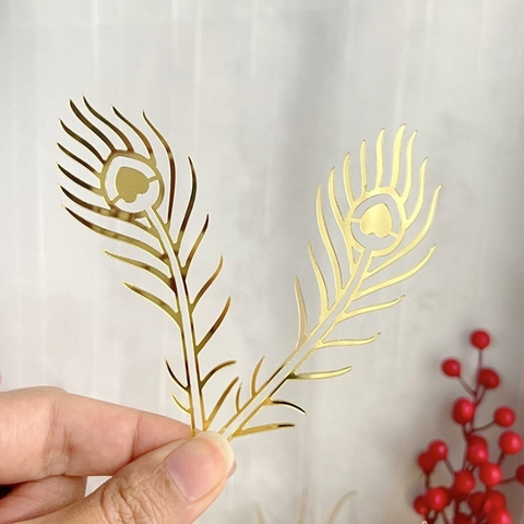 Set topper mica tết cặp lông công vàng