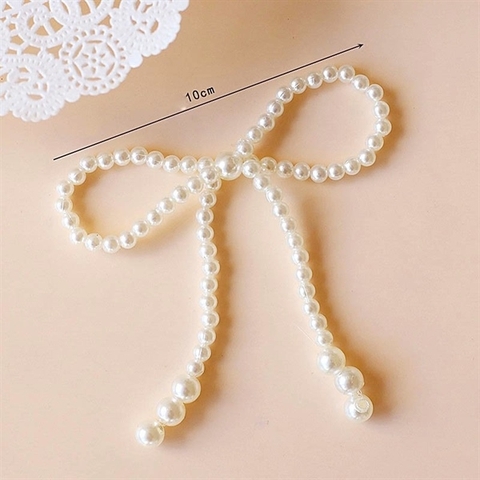 Trang trí nơ ngọc trai trắng