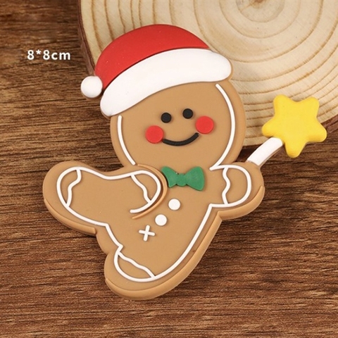 Trang trí slc GS kẹo gừng đội mũ Noel đỏ cầm sao vàng