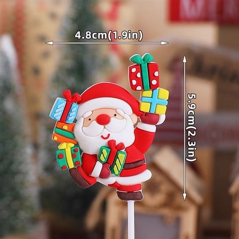 Trang trí slc GS ông già Noel ôm rất nhiều hộp quà (CC)