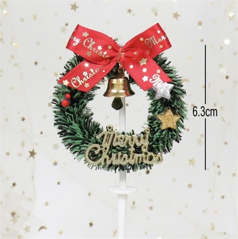 Trang trí GS vòng nguyệt quế Merry Christmas + nơ + chuông + 2 ngôi sao