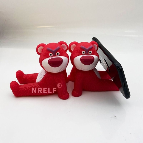 1 cái giá đỡ điện thoại hình gấu bằng nhựa kute