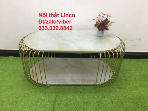 J2 Bàn sofa mặt kính oval 2 tầng 1m x 50 đặt tại sảnh chờ tiệm shop