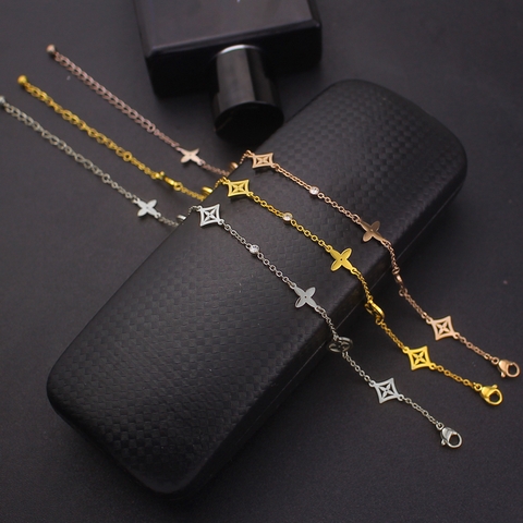 Lắc chân Titan - TA649 - thời trang LV