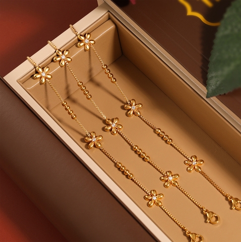 Lắc tay Titan - TA468 - hoa mai cách điệu