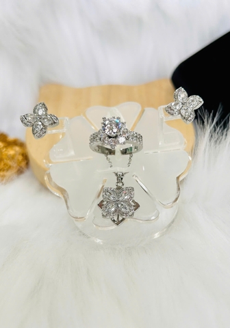 Set trang sức Titan - TM054 - biểu tượng cánh hoa xoay