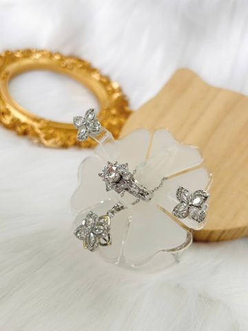 Set trang sức Titan - TM054 - biểu tượng cánh hoa xoay