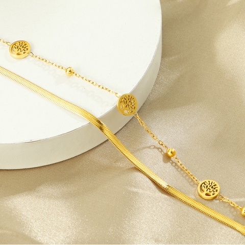 Vòng tay titan vàng charm cây layer 2501003