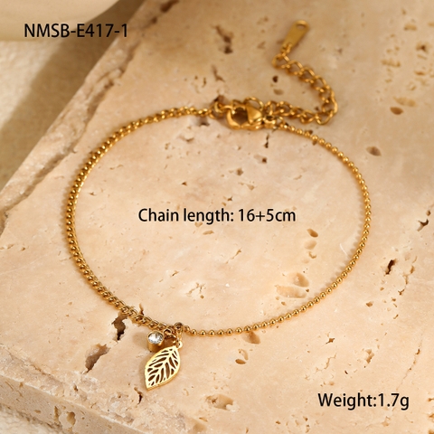 Vòng tay titan vàng charm lá  2600063
