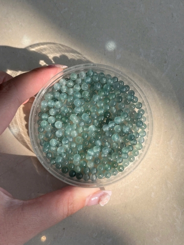 Hạt ngọc Jadeite A lam băng( Gua)
