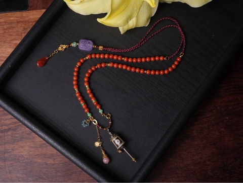 Vòng thiết mã não nam hồng mix charm