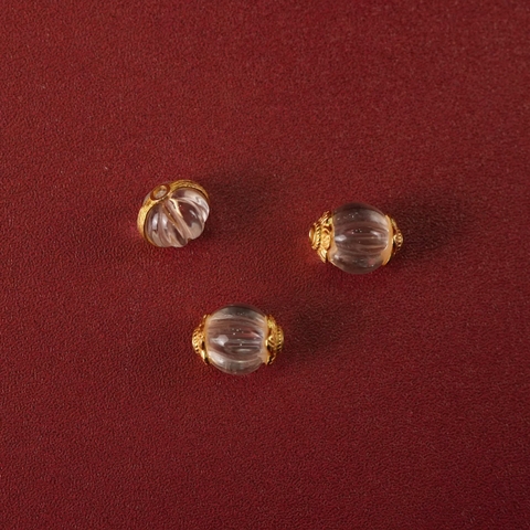 Charm thạch anh bổ ô bọc bạc