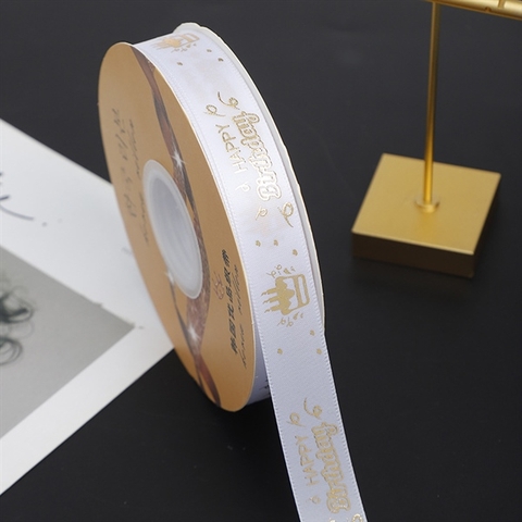 RB HPBD chữ nhũ VÀNG nền TRẮNG 2.5cm*50m