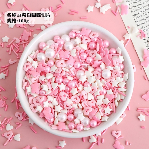Cốm mix tim + bướm tone trắng hồng 100g