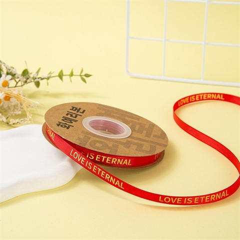 Rb LOVE IS ETERNAL khổ nhỏ 1cm*30m MÀU ĐỎ TƯƠI chữ nhũ vàng