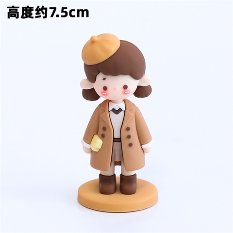 Bé gái đứng áo vest nâu