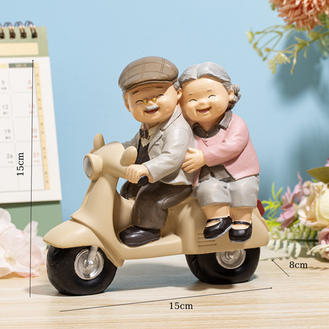 Đồ chơi trang trí ông bà lái xe máy(OB)