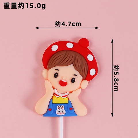 Kute bé trai chống cằm băng đô đỏ chấm bi