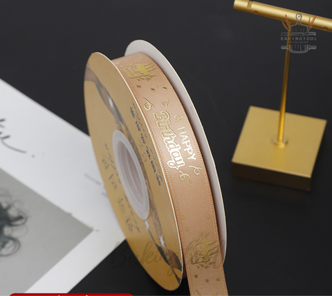 Rb HPBD chữ nhũ nền vàng đồng 2.5cm*25m