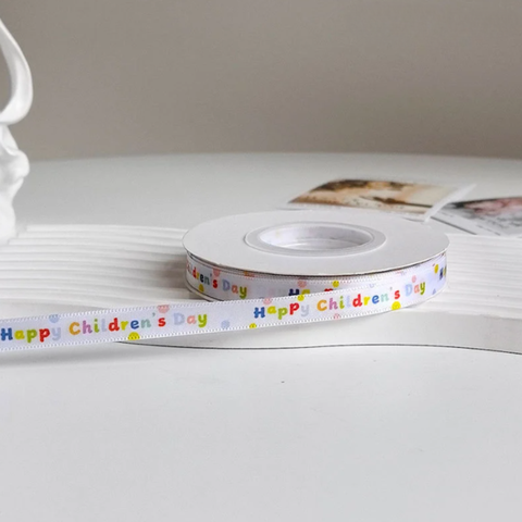 Rb lụa Happy children day chữ sắc màu khổ 1cm*22m
