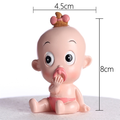 Em bé gái sơ sinh ngậm ti hồng (sứ)