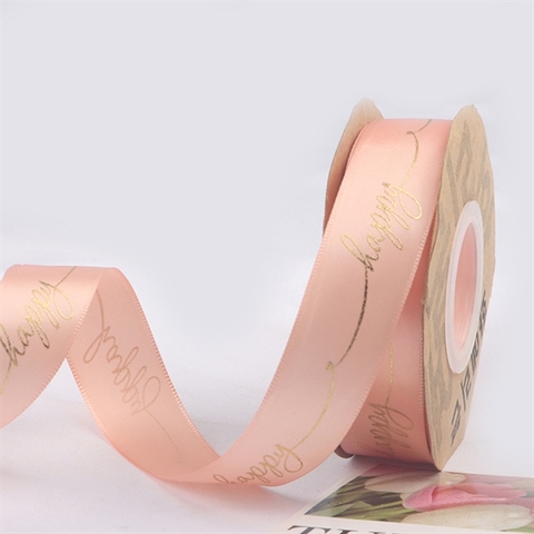 Rb lụa chữ happy nghiêng ép nhũ vàng khổ 2,5cm*22m MÀU HỒNG CAM